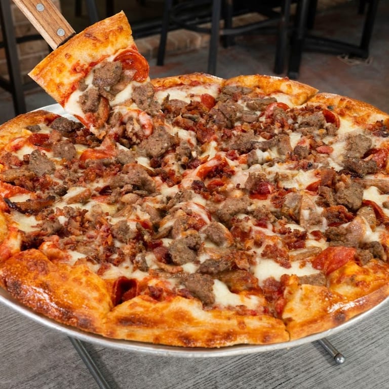 Indulge in Our Meat Lovers Pizza